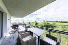 Strandnixe 5 Sterne Ferienwohnung mit Eckbalkon und traumhaften Blick in Wustrow
